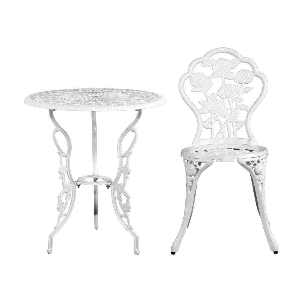 A white Gardeon chair front facing and matching round table with rose designs, set against a white background.