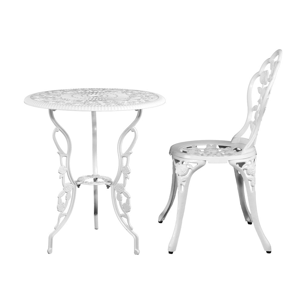 Side view of a white Gardeon chair and matching round table with rose designs, set against a white background.