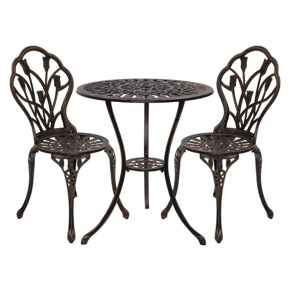 A bronze Gardeon 3-piece outdoor bistro set, including a round table and two chairs with a tulip floral pattern on the frame, made of cast aluminum, and set on a white background.