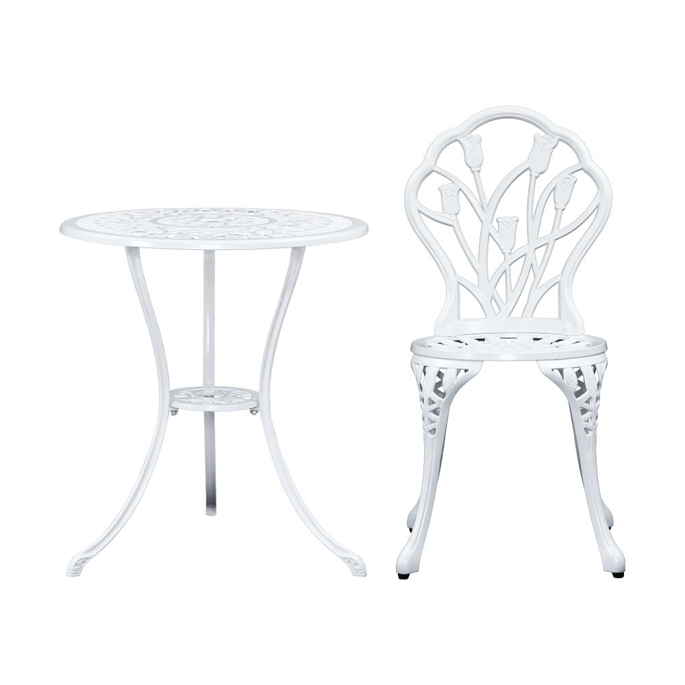 A white Gardeon round table and chair with intricate cut-out tulip flower patterns, on a white background setting.