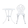 A white Gardeon round table and chair with intricate cut-out tulip flower patterns, on a white background setting.