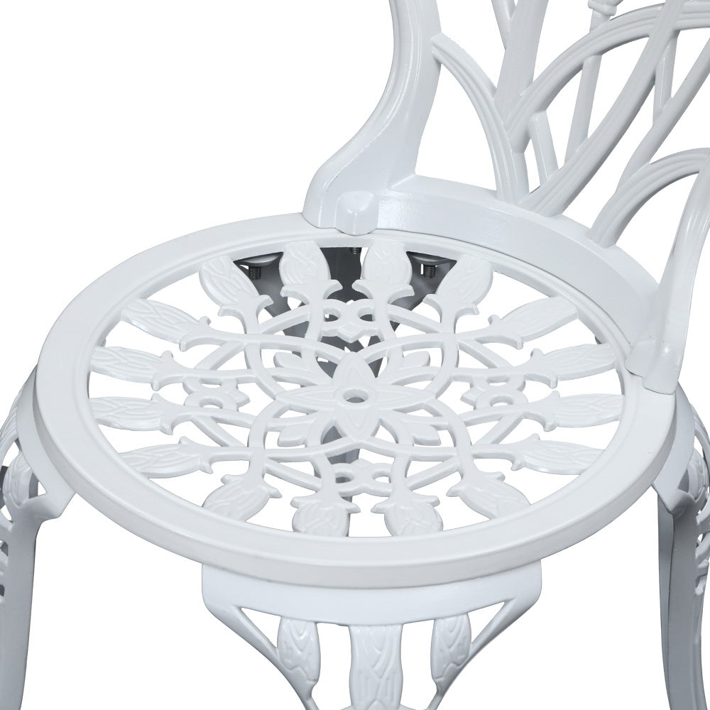 Close-up view of the white Gardeon seat part of the chair with intricate cut-out tulip flower patterns, on a white background.