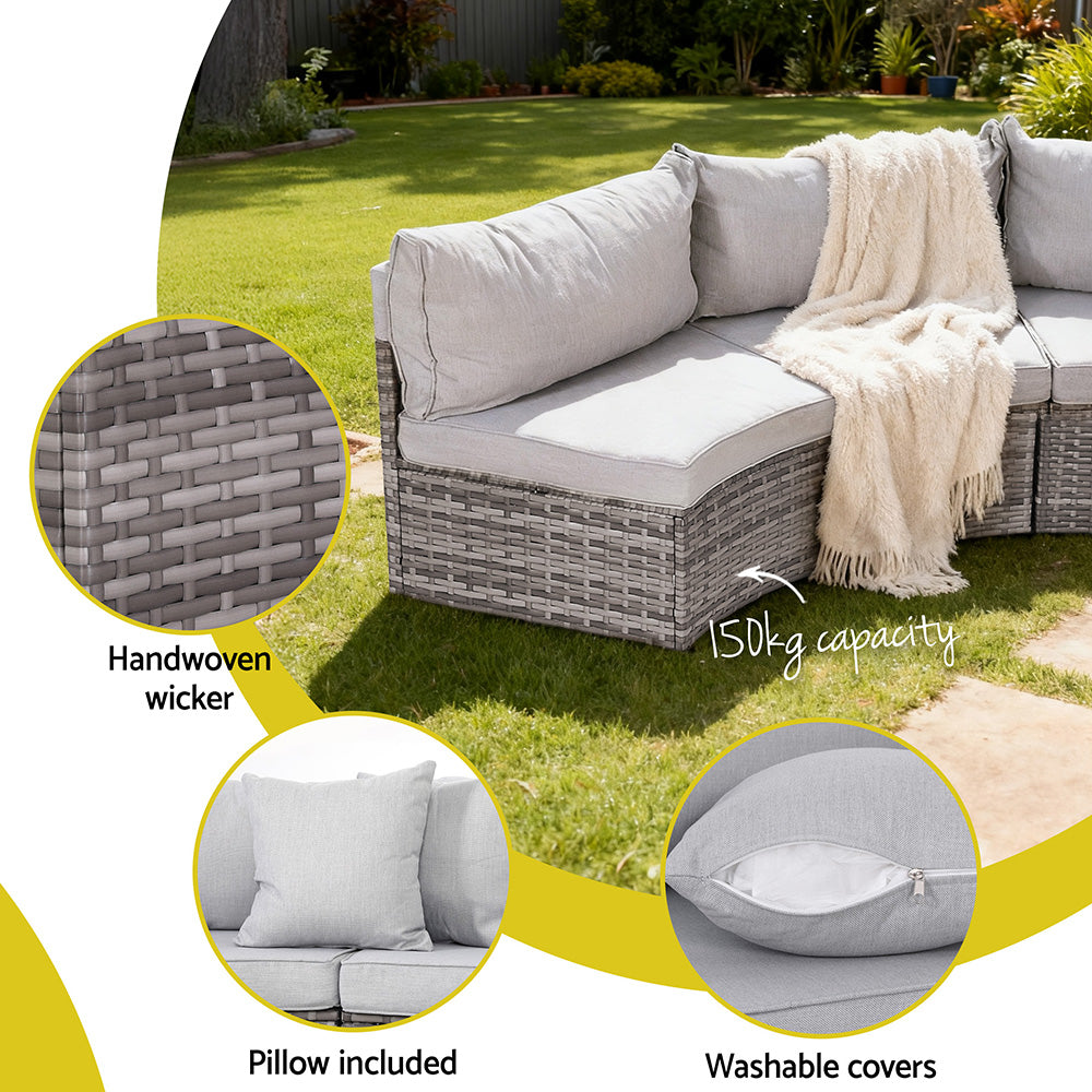 Outdoor sofa set with cushions and blanket on grass, featuring handwoven wicker, pillow included, washable covers, and capacity details.
