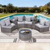 Outdoor patio furniture set with cushions by a pool