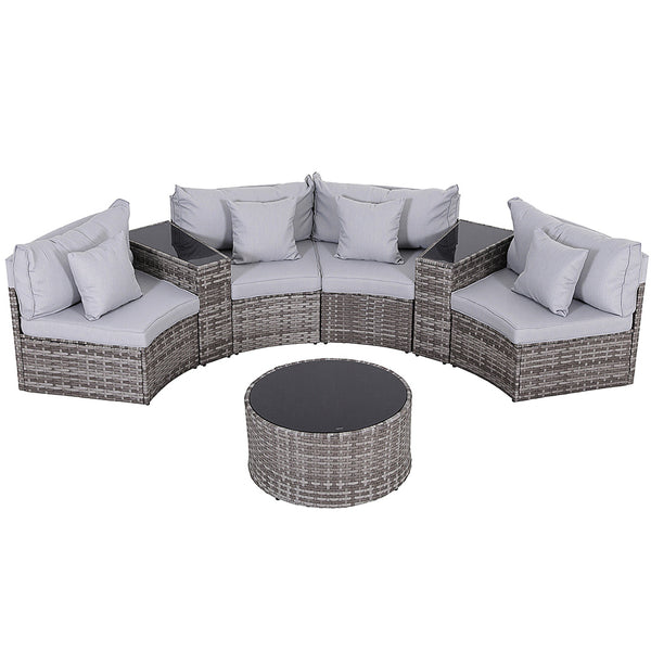 Outdoor patio furniture set with cushions on a white background