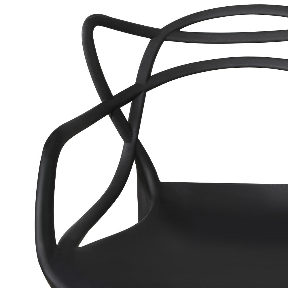 Close up image of a black, stackable outdoor dining chair zooming in on its curved design and a smooth finish on a white background.