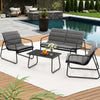 Outdoor patio set with gray cushions and black frames by a pool