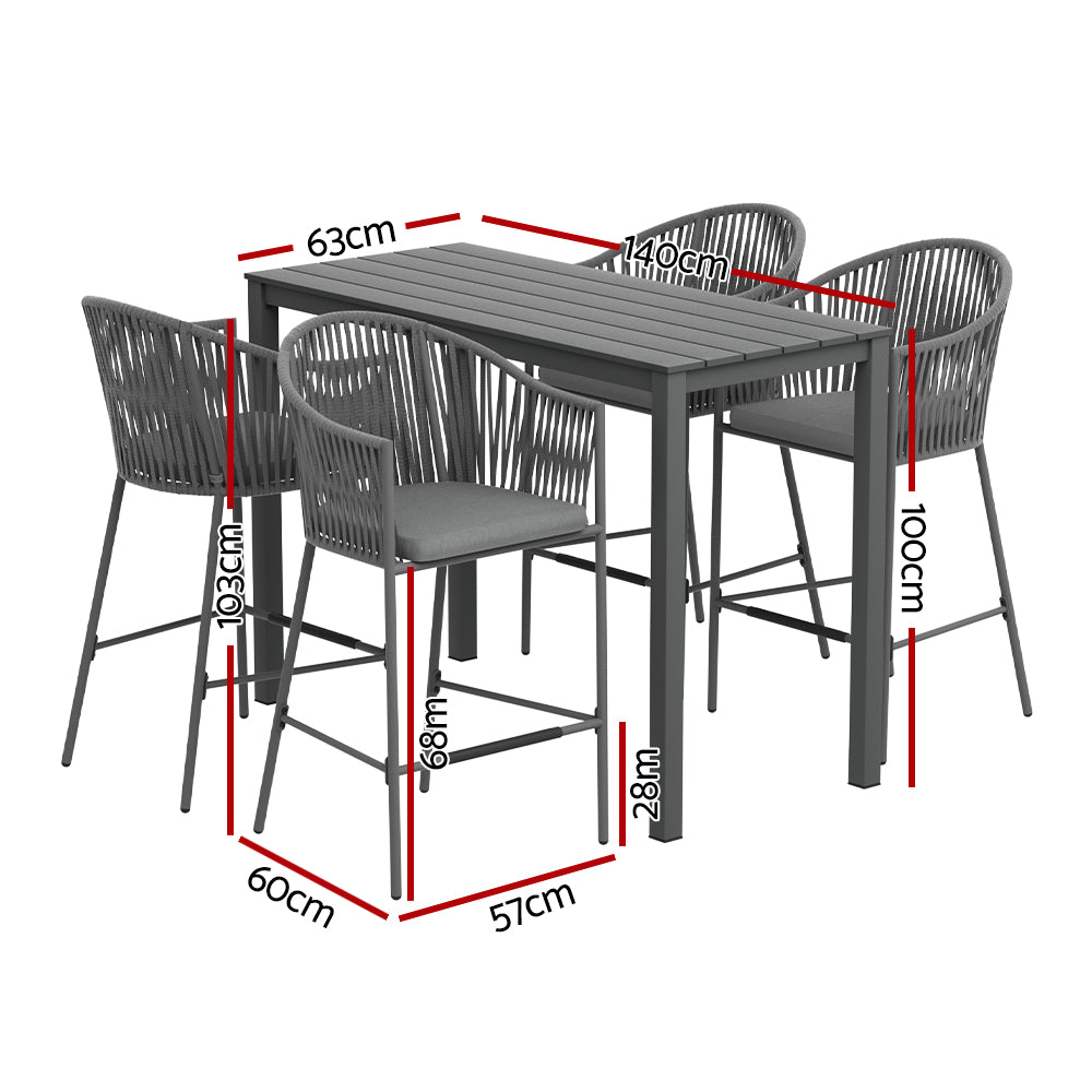A five-piece outdoor bar set with a rectangular dining table and four grey rope chairs with slanted backrests and handrails, showing its measurements and set on a white background.