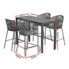 A five-piece outdoor bar set with a rectangular dining table and four grey rope chairs with slanted backrests and handrails, showing its measurements and set on a white background.