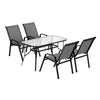Outdoor furniture set with a table and four chairs on a white background
