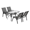 Outdoor furniture set with a table and four chairs on a white background