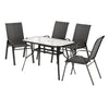 Outdoor furniture set with a table and four chairs on a white background