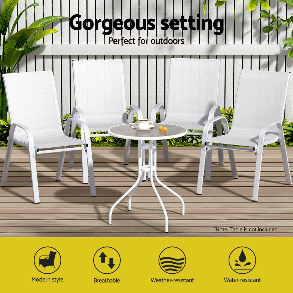 White outdoor furniture set with table on a wooden deck, featuring text and icons about product features.