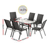 Dining table set with chairs and measurements on a white background