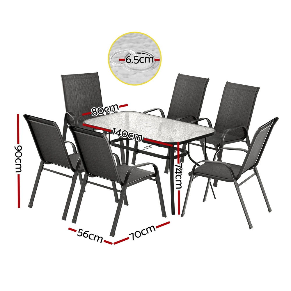 Dining table set with chairs and measurements on a white background