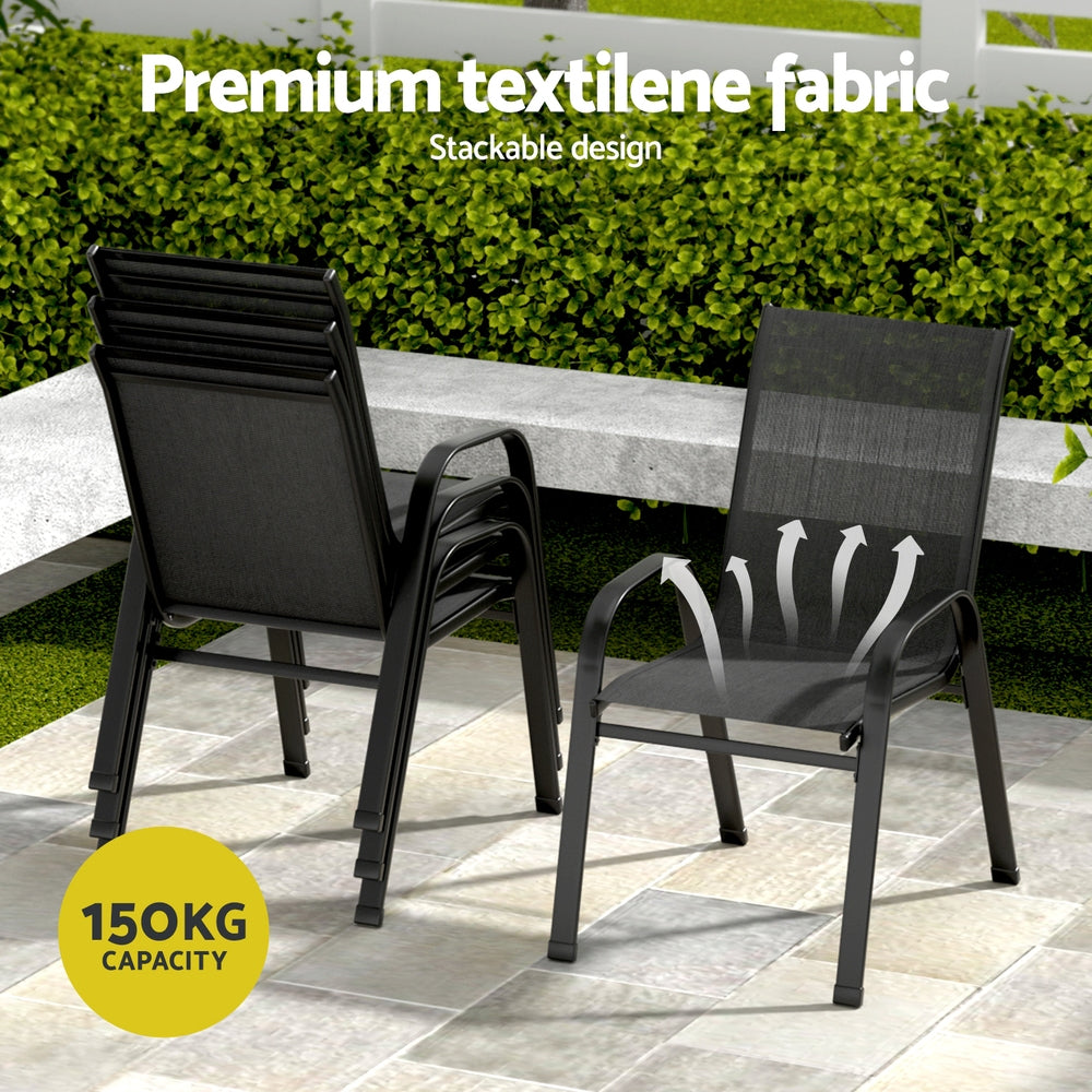 Two black chairs with premium textilene fabric on a patio area.