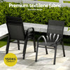 Two black chairs with premium textilene fabric on a patio area.