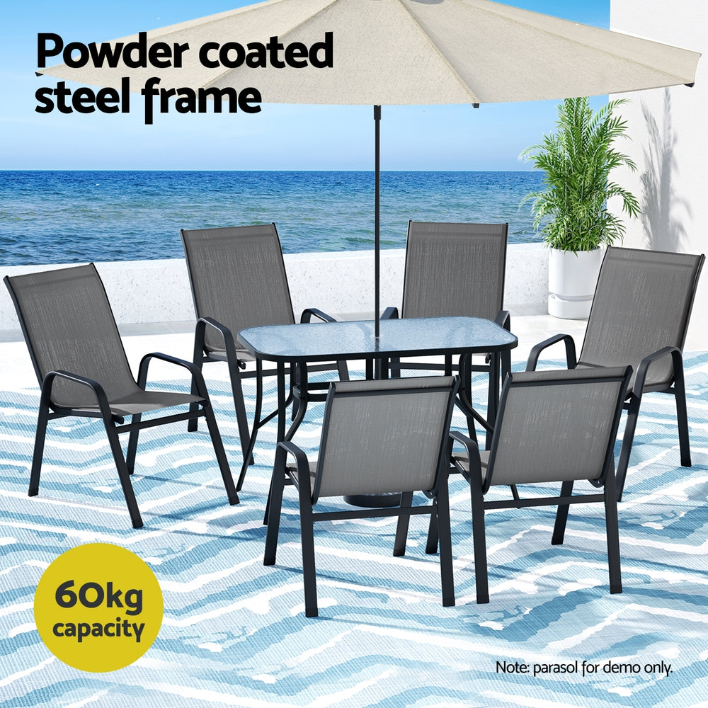 Outdoor furniture set with table and chairs on a beach setting, featuring a powder-coated steel frame.