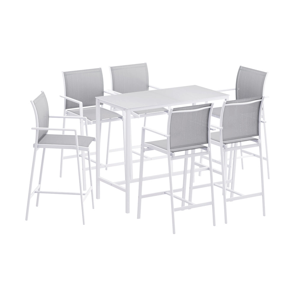 White dining table with four gray chairs on a white background