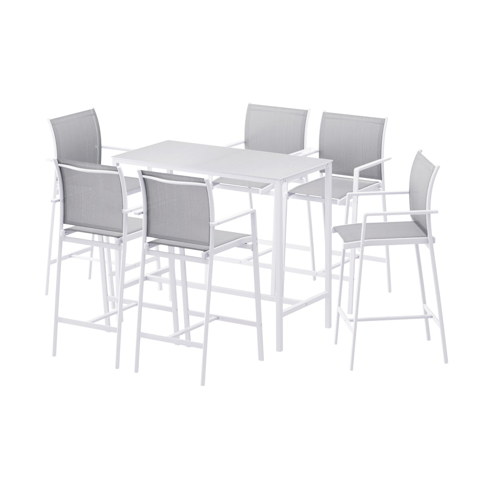 White dining table with six matching chairs on a white background