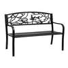 Black metal bench with decorative backrest on a white background