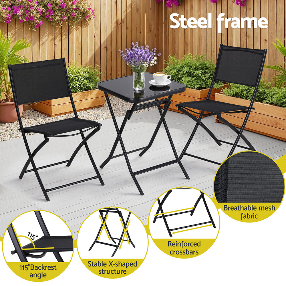 Black metal outdoor furniture set with table and chairs on a patio, featuring steel frame details.