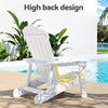 White Adirondack chair with high back design by a poolside, featuring a pool and plants in the background.