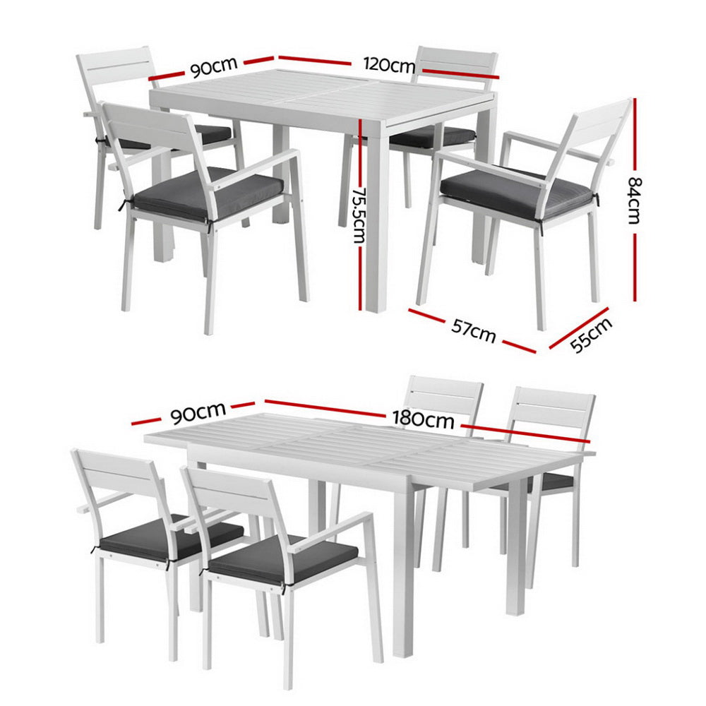 Dimensions of a white dining table and chairs set on a white background