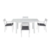 White dining table with four matching chairs on a white background