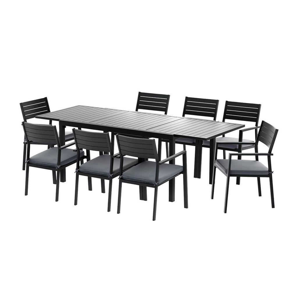 Outdoor dining set with a rectangular table and eight chairs on a white background