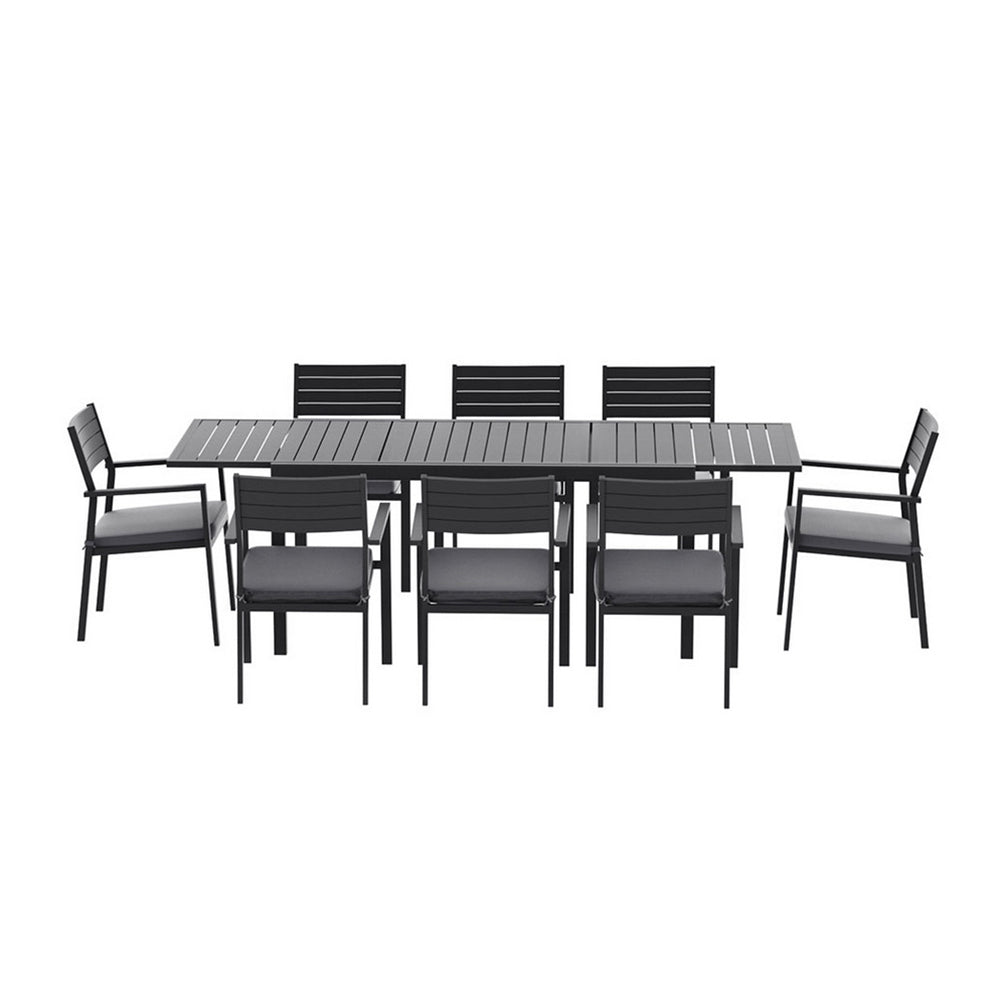 Outdoor furniture set with a rectangular table and eight chairs on a white background