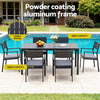 Outdoor patio set with table and chairs by a pool, featuring powder-coated aluminum frame.