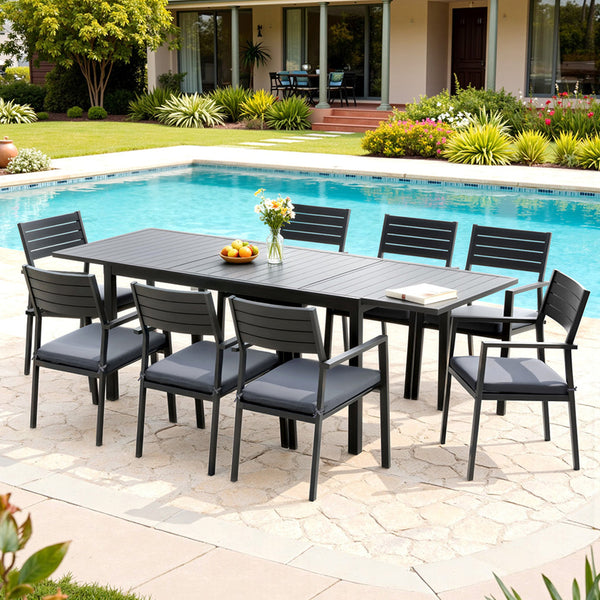 Outdoor dining set with table and chairs by a poolside