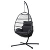 Black hanging egg chair with cushions on a white background