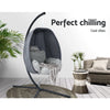 Hanging egg chair with a plant and sofa in the background, labeled 'Perfect chilling'.