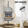 360-degree rotatable hanging chair with gray cushion in a room setting.