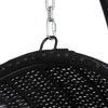 Top of a black wicker outdoor egg swing chair showing its chain and how it hangs, set on a white background.