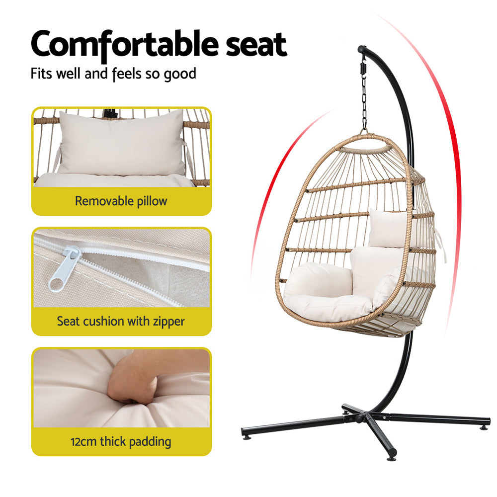 Hanging chair with white cushion and black stand, featuring text about comfort and features.