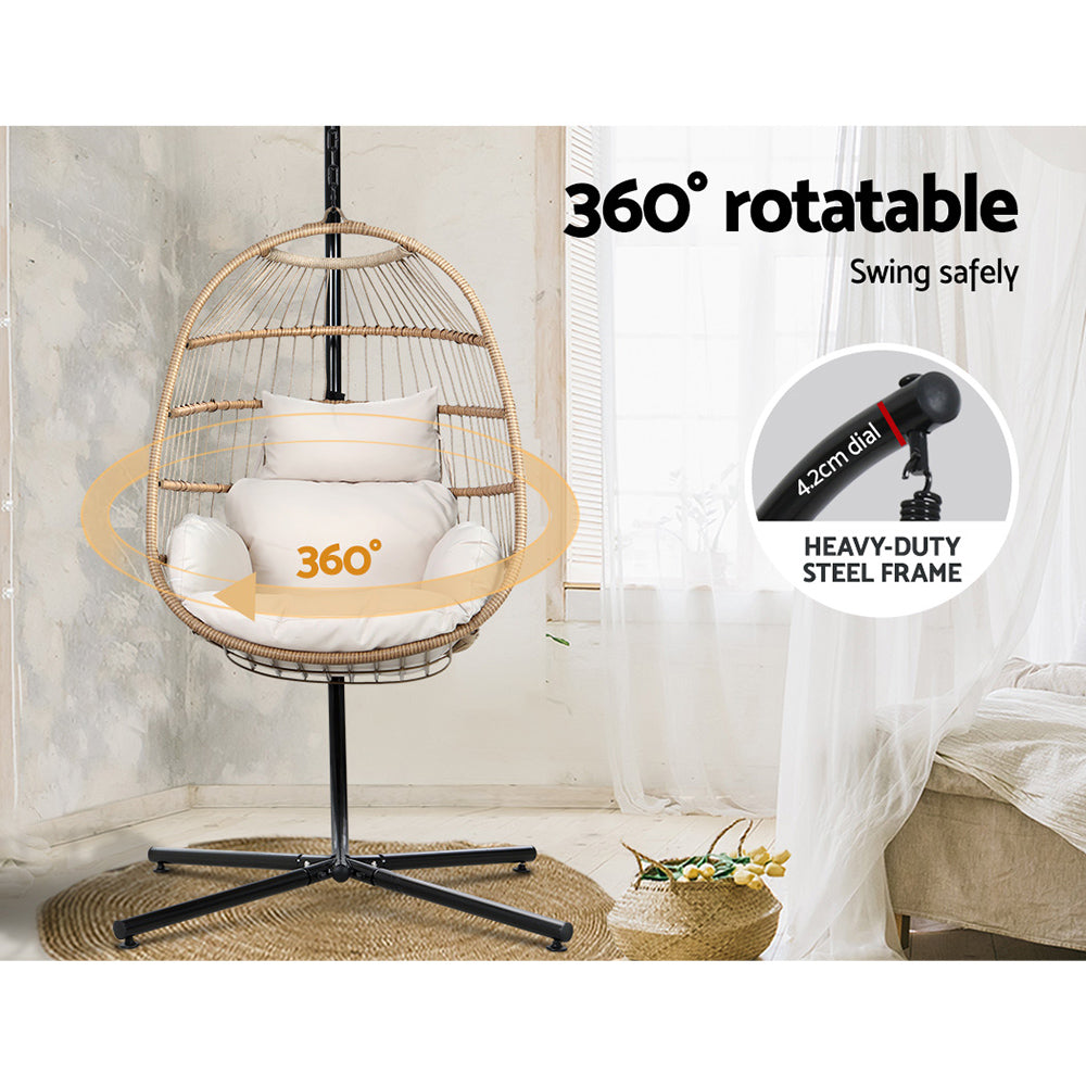 360-degree rotatable egg-shaped chair with a heavy-duty steel frame in a room setting.