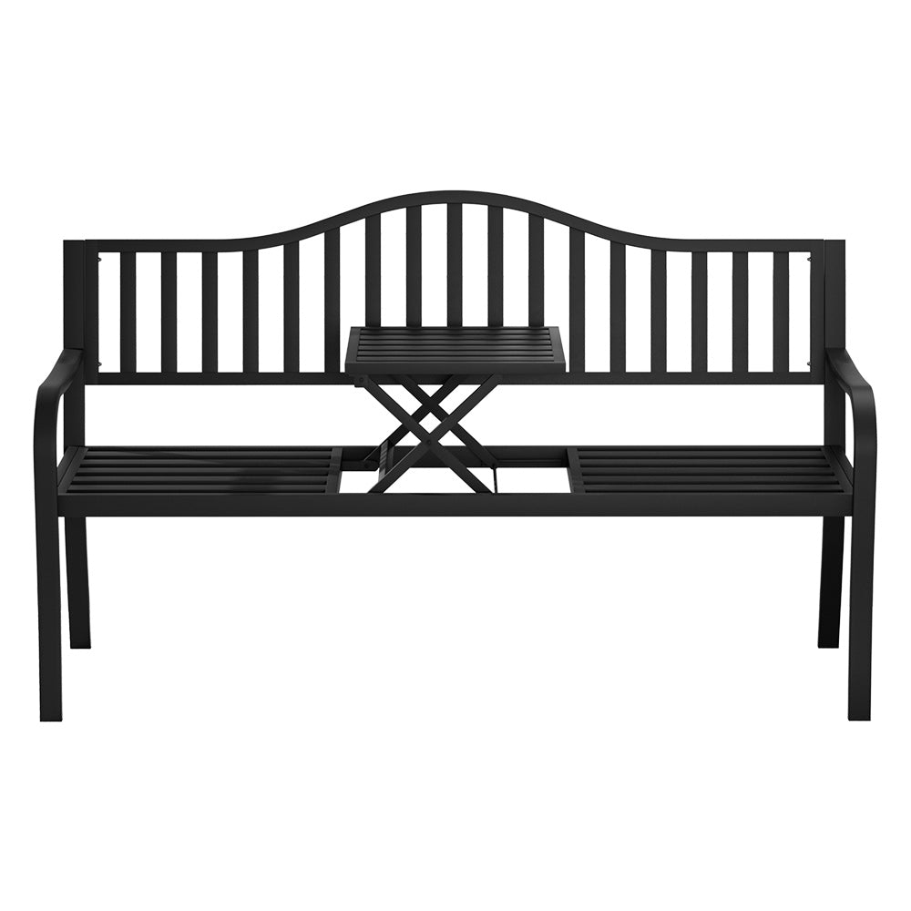 A black steel outdoor garden bench with a foldable table, facing front on, featuring a slatted design for the seat and backrest, and a powder-coated finish and set on a white background.