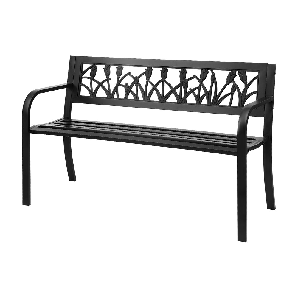 Black metal bench with decorative backrest on a white background