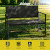 A 2-seater Gardeon outdoor garden bench with a grey rattan seat and black powder-coated steel frame showing it has a weight capacity of 150kg in a garden setting with trees in the background.