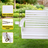 White wooden swing with metal hanging chain in a garden setting