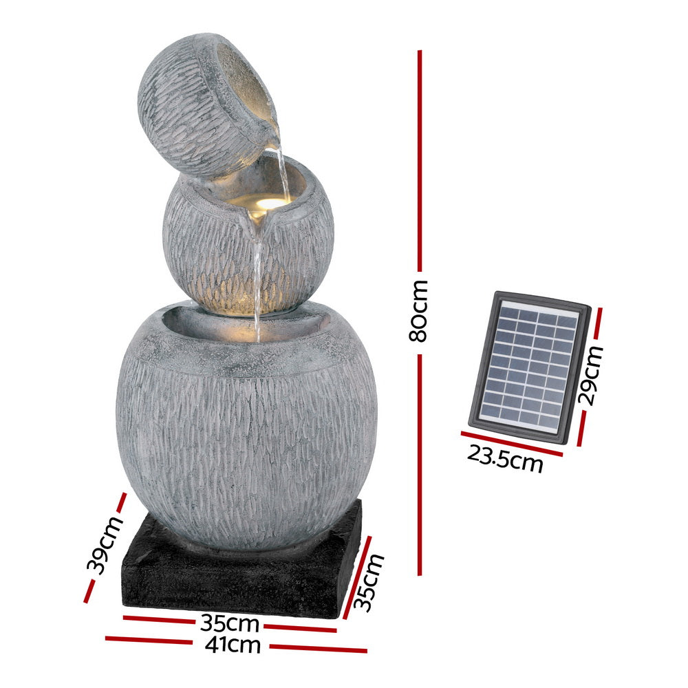A three-tier bowls cascading water fountain feature with LED lights, and solar panel, made of polyresin, in a grey colour with black base, showing its dimensions and set against a white background.