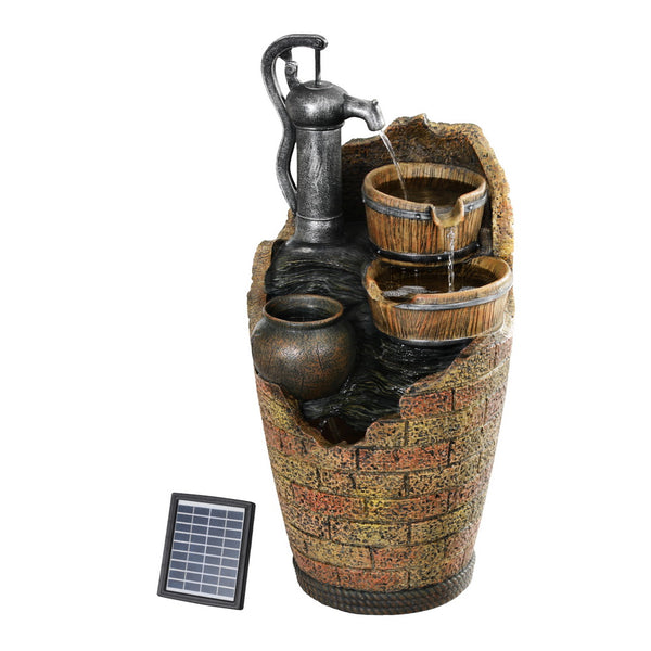 A solar-powered cascading hand pump design fountain with elaborate sculptural details and a solar panel included.