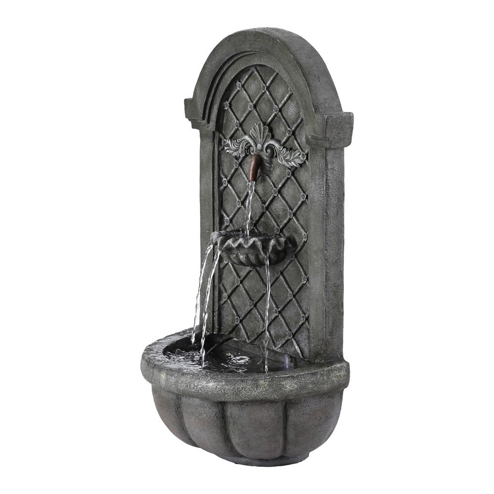 A grey Gardeon solar fountain with a classic cascading design, front/side on view, wall mounted on a white background.