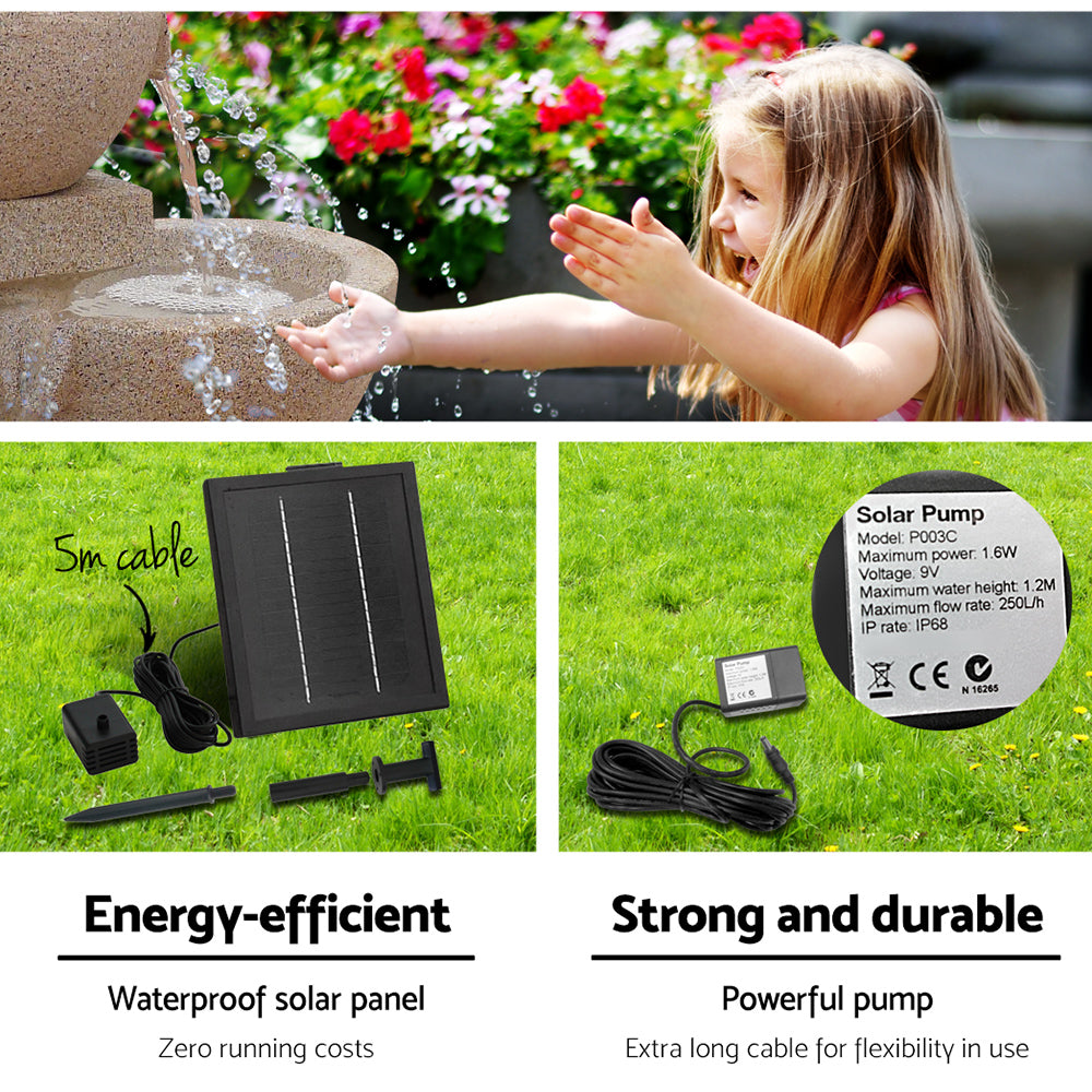A sand colour water feature with bowls, featuring three split photos showing different views. One is a close-up view of the cascading water pouring and splashing from the top bowls to the one below with a happy little girl putting her hands in the splashing water drops, with hanging flowers in the backdrop. The next 2 images are set on green grass - one showing the solar panel and all its components and the other of the pump showing all its specifications.