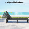 Black adjustable lounge chair with ocean view