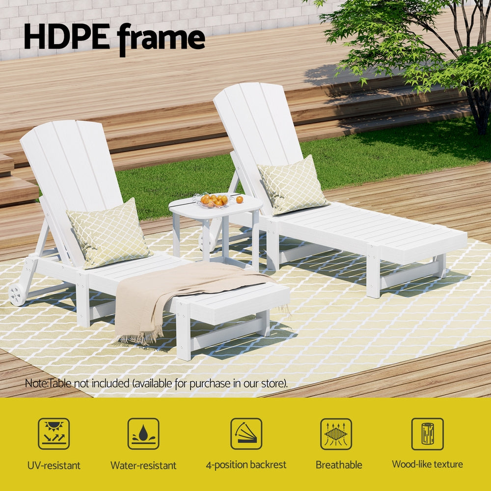White outdoor lounge chairs with a table on a wooden deck, featuring HDPE frame text.