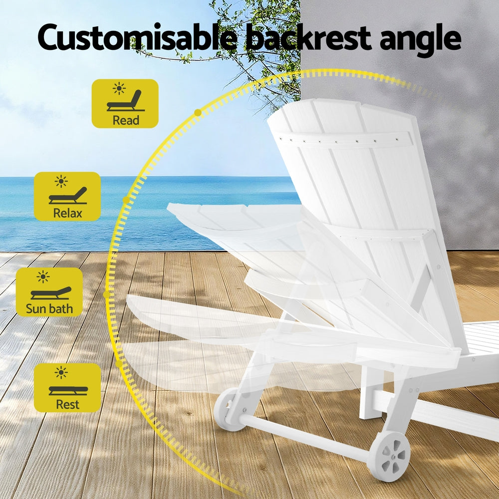 White lounge chair with customizable backrest angle on a wooden deck by the ocean.